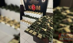 Hatay'da bir otomobilde 202 ruhsatsız tabanca ele geçirildi