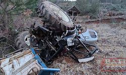 Traktör dere yatağına yuvarlanıp ikiye bölüdü sürücüsü yaralandı