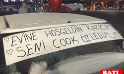Adana’da Romantik Karşılama: Eşini Balonlar ve Pankartla Karşıladı