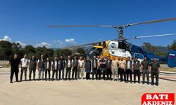 Kumluca'da Orman Yangınlarına Karşı Havadan Sıkı Denetim: Bölge Müdürü Kayıran'dan Helikopter Ekibine Ziyaret