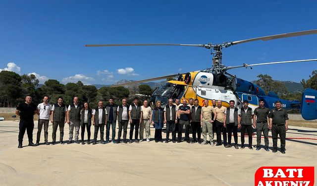 Kumluca'da Orman Yangınlarına Karşı Havadan Sıkı Denetim: Bölge Müdürü Kayıran'dan Helikopter Ekibine Ziyaret